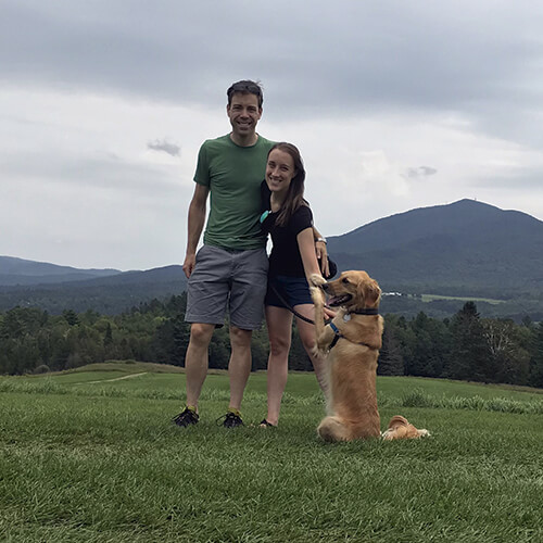 Dr. Cole Archambault with his wife Maris and their golden retriever Sienna