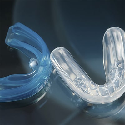 Two mouthguards displayed side by side. 